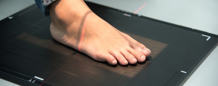 Photograph close up of foot while taking an x-ray